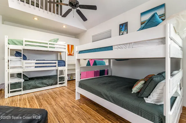 a bedroom with a bed and cabinets