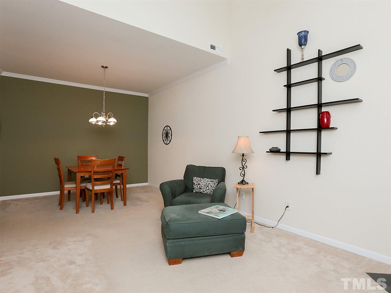 2708 Andover Glen Road Raleigh, NC 27604 - Photo 11 of 25 a dining room with furniture and wooden floor