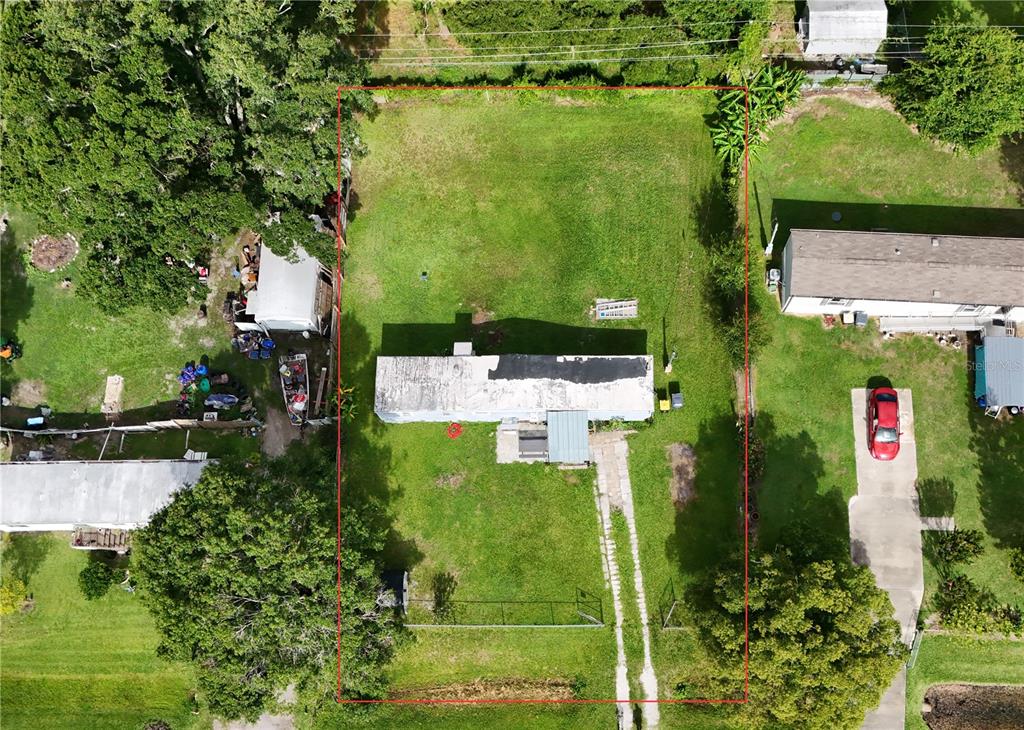4816 Rustic Court East Lakeland, FL 33810 - Photo 1 of 16 an aerial view of a house with a yard basket ball court and outdoor seating