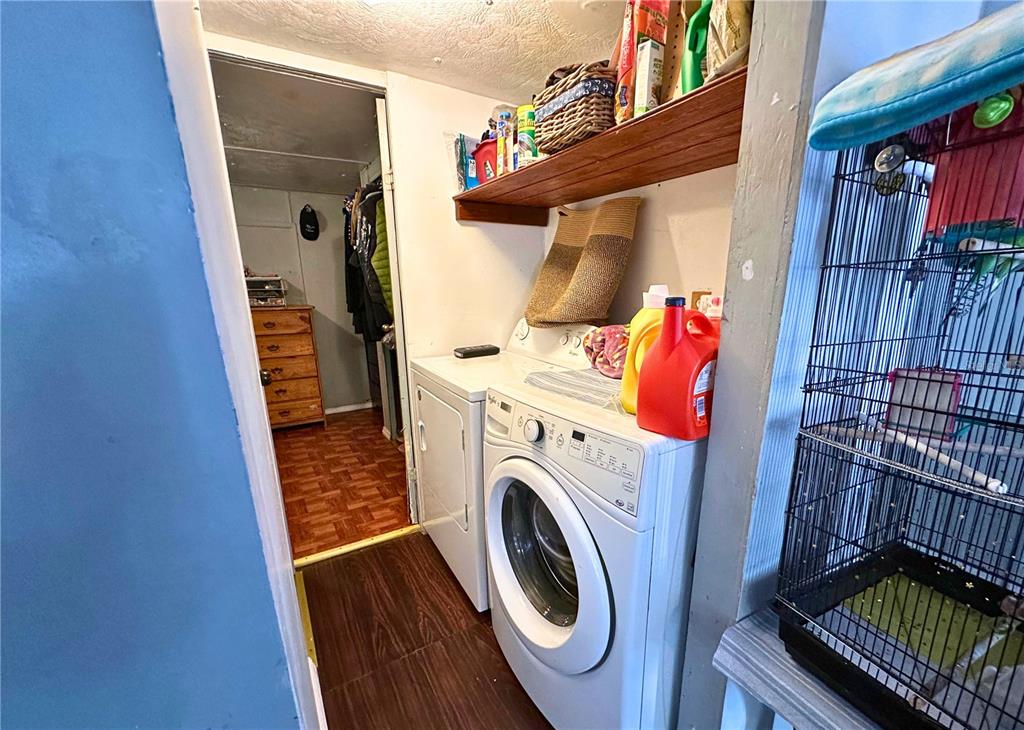 4816 Rustic Court East Lakeland, FL 33810 - Photo 16 of 16 a utility room with dryer and washer