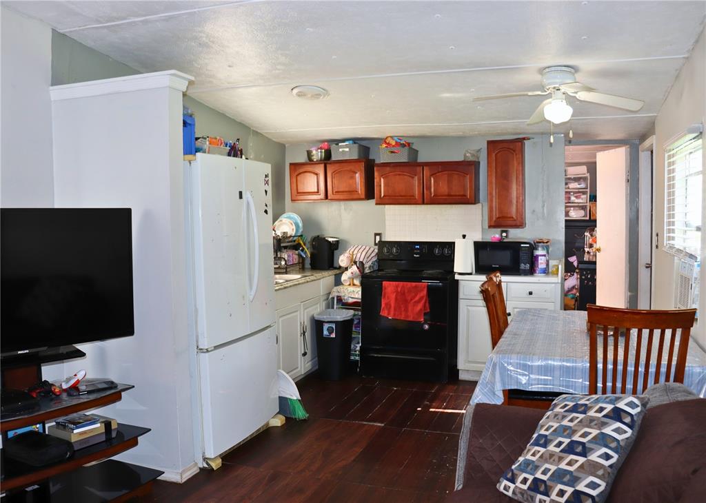 4816 Rustic Court East Lakeland, FL 33810 - Photo 5 of 16 a living room with furniture and a flat screen tv