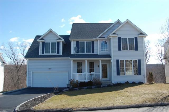 25 La Rovera Terrace Ansonia, CT 06401 - Photo 1 of 1 a front view of a house with a yard