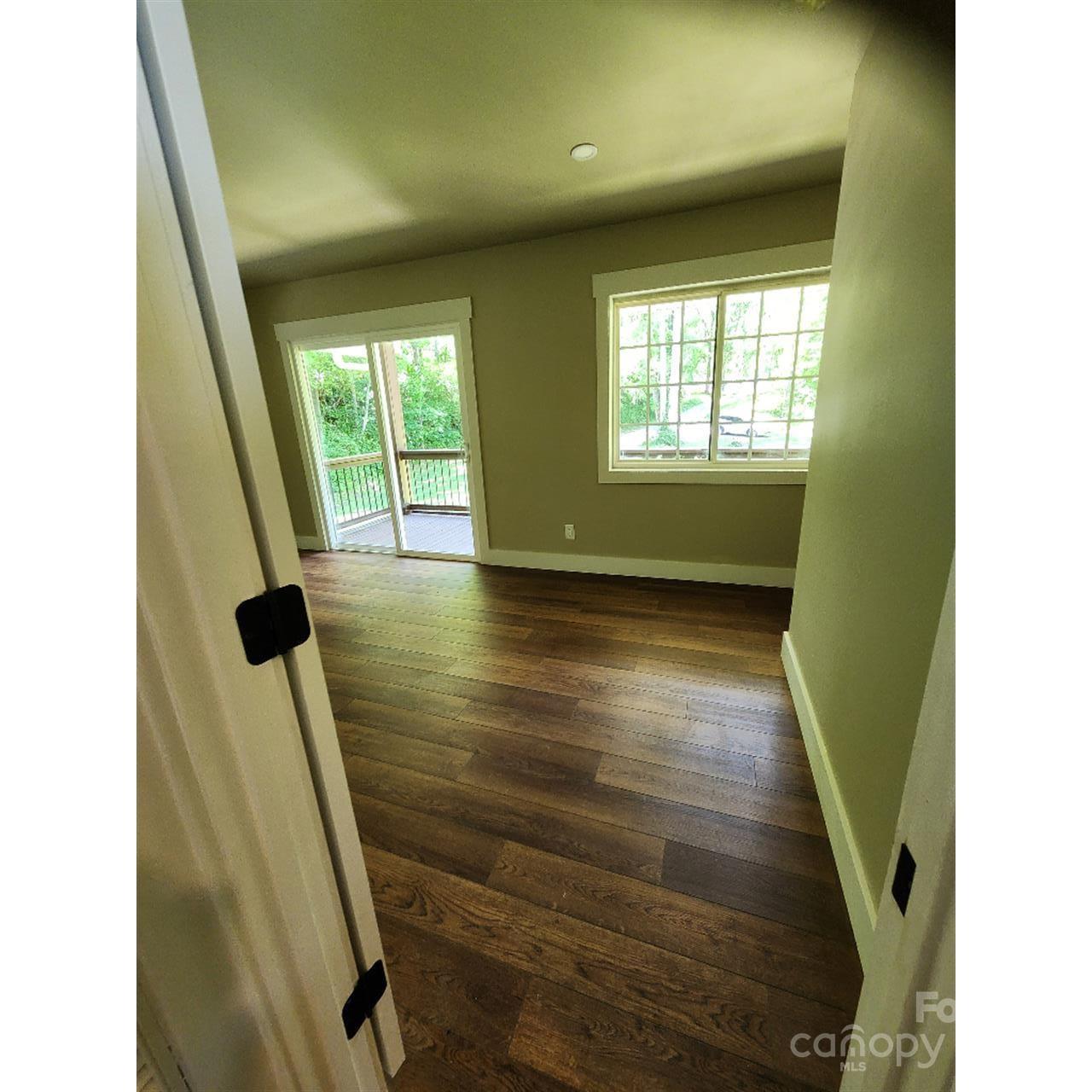 283 Robin Drive Marion, NC 28752 - Photo 19 of 30 a view of a hallway with windows