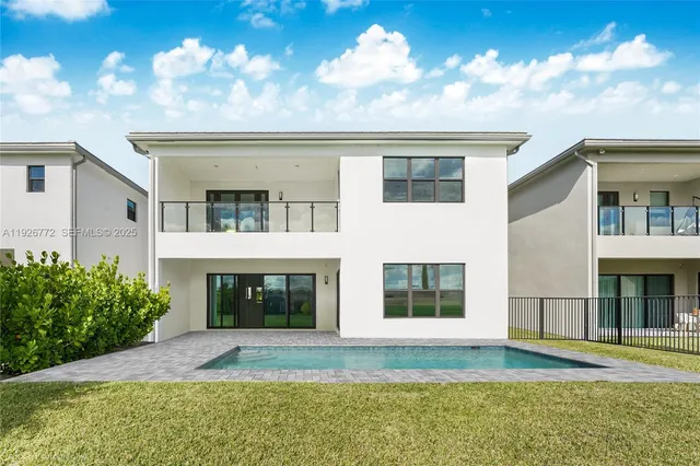 a view of a lake with a big yard