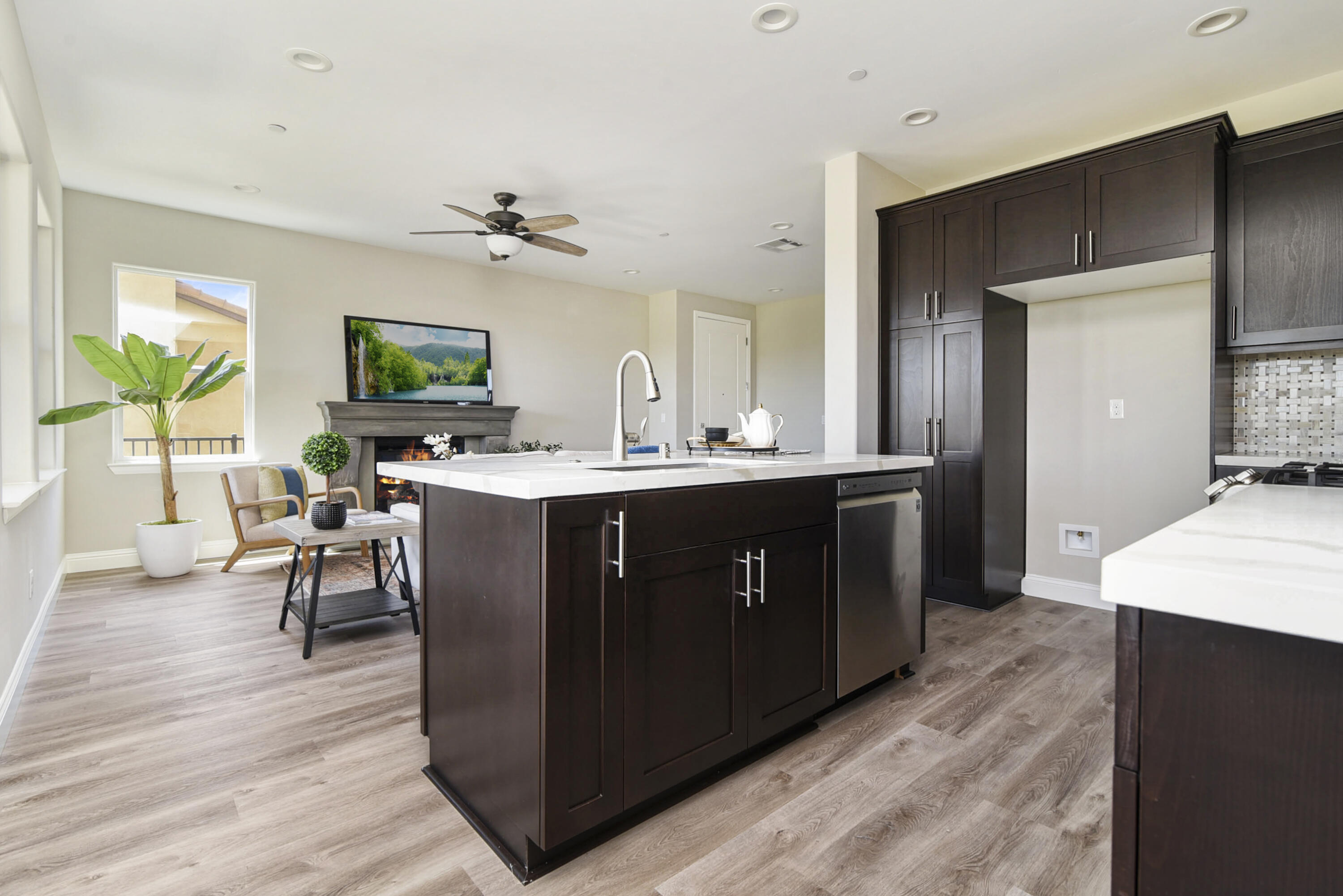 280 Oak Hill Drive Lompoc, CA 93436 - Photo 13 of 31 a kitchen with a table chairs refrigerator and a sink