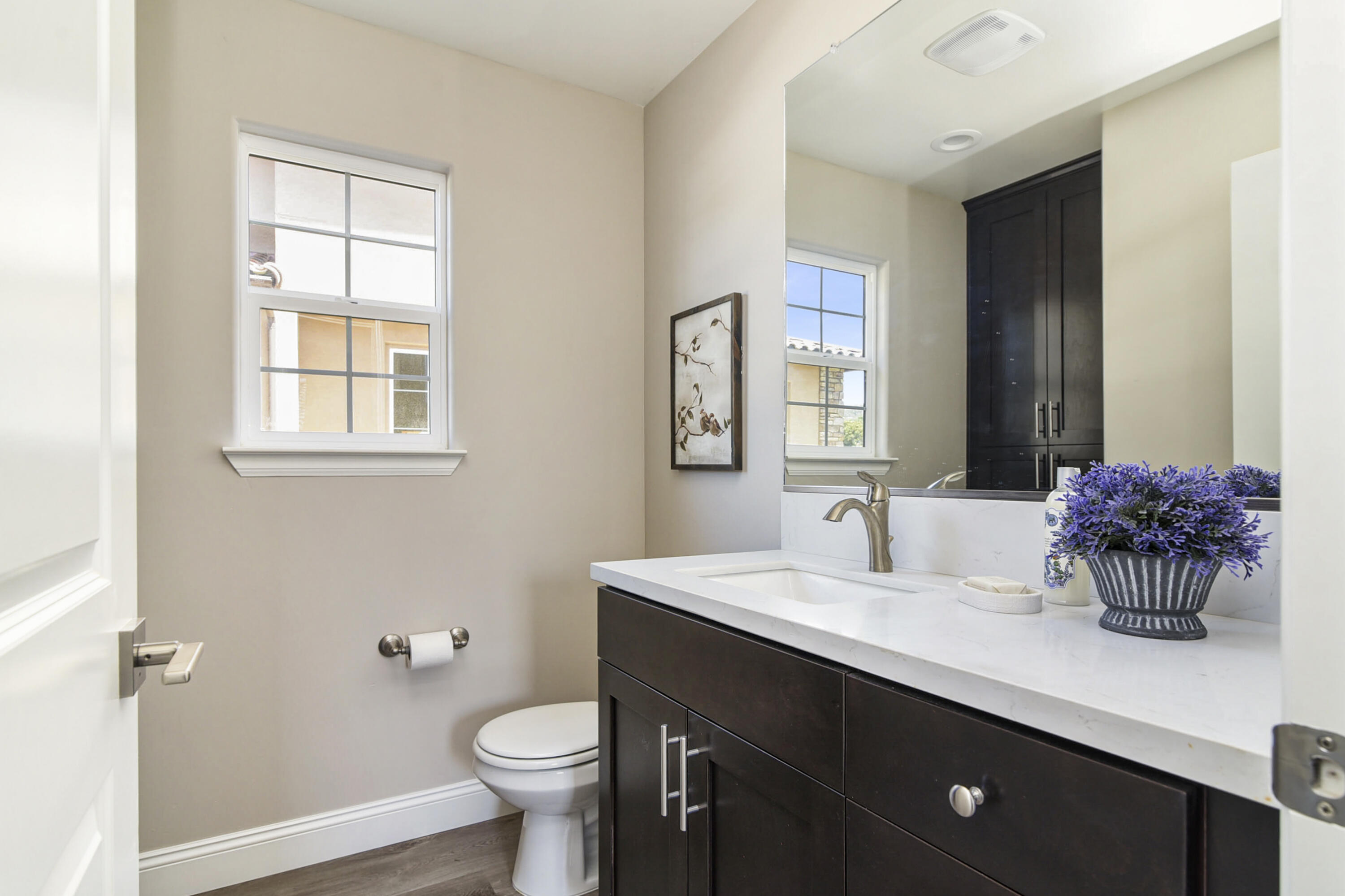 280 Oak Hill Drive Lompoc, CA 93436 - Photo 22 of 31 a bathroom with a double vanity sink toilet and a mirror