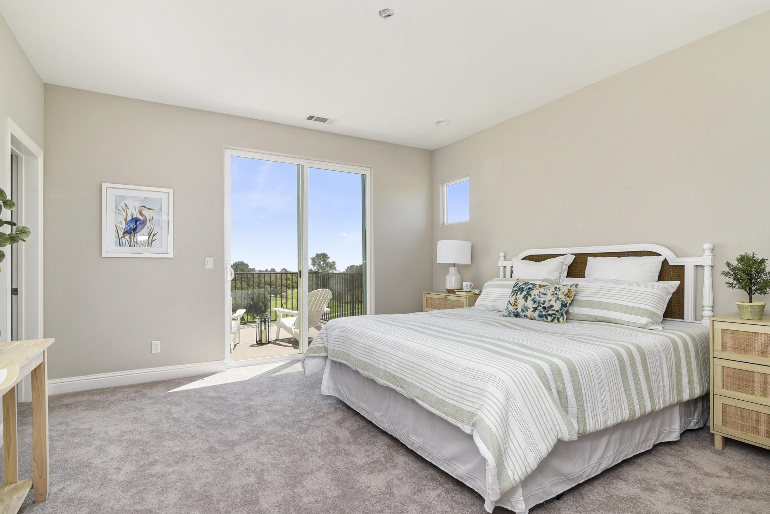 280 Oak Hill Drive Lompoc, CA 93436 - Photo 23 of 31 a bedroom with a bed lamp and a large window