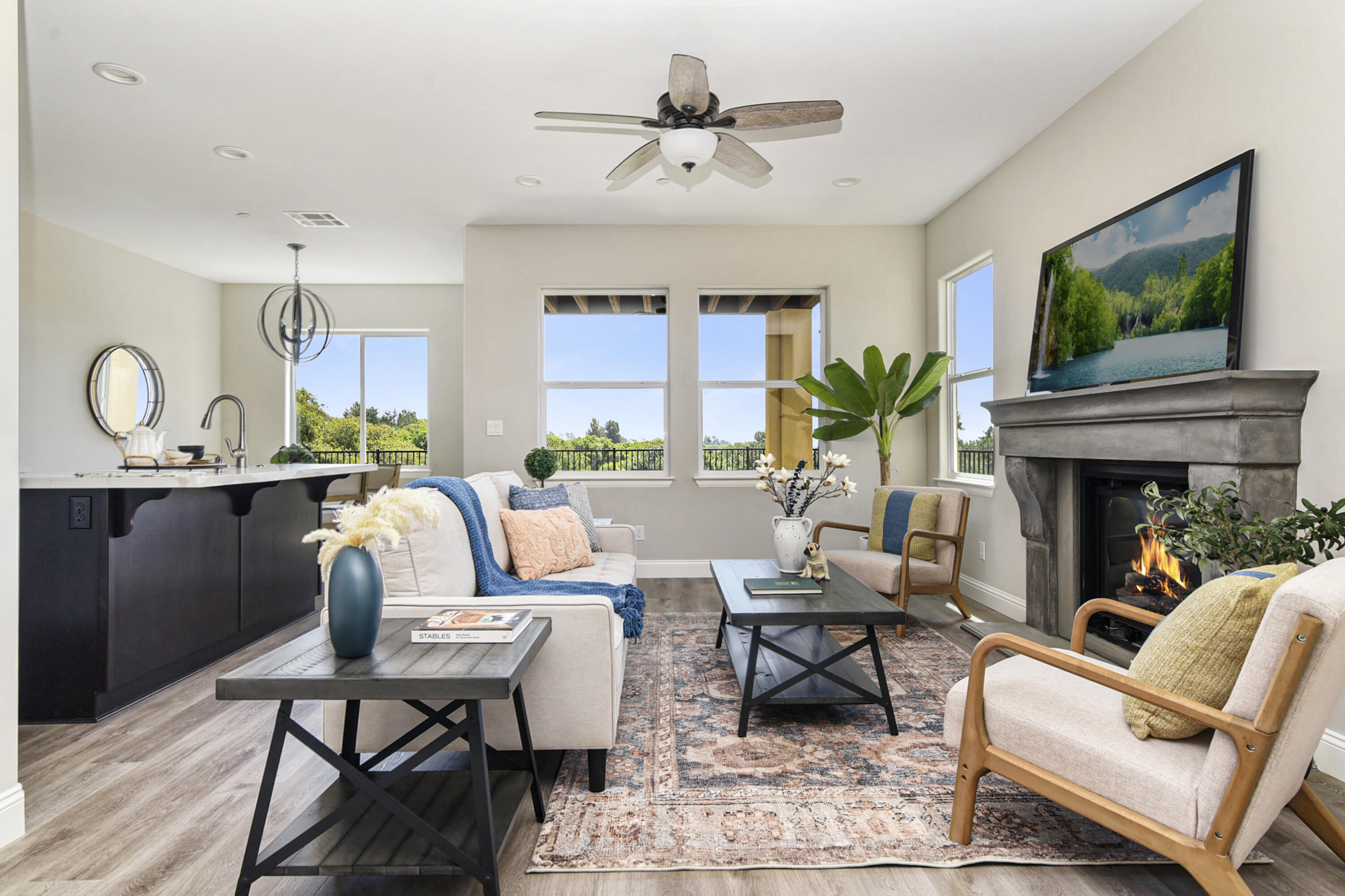 280 Oak Hill Drive Lompoc, CA 93436 - Photo 10 of 31 a living room with furniture a fireplace and a flat screen tv