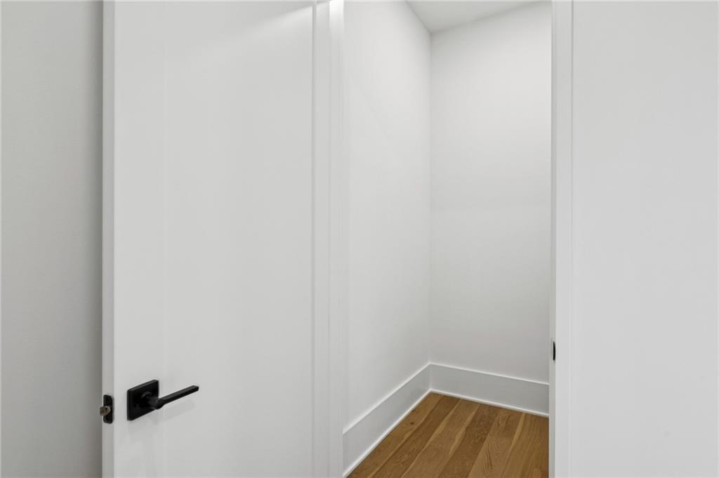 407 Linden Avenue Northeast, Unit A Atlanta, GA 30308 - Photo 21 of 65 a view of a room with wooden floor