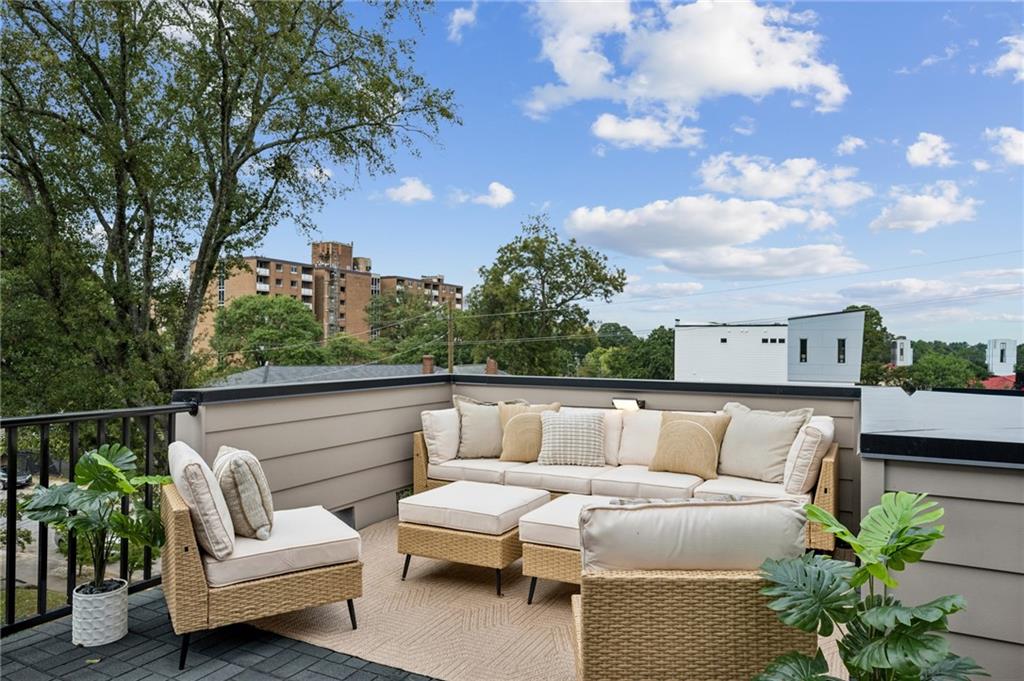 407 Linden Avenue Northeast, Unit A Atlanta, GA 30308 - Photo 44 of 65 a view of sitting area with furniture and a fire pit