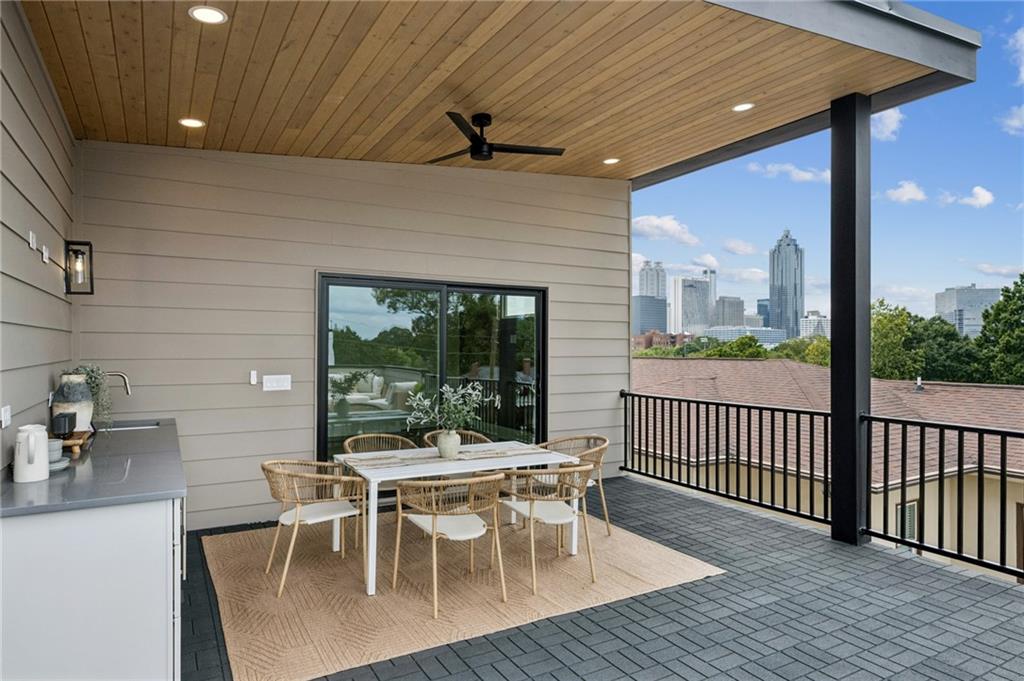 407 Linden Avenue Northeast, Unit A Atlanta, GA 30308 - Photo 45 of 65 a view of a dining room with furniture window and outside view
