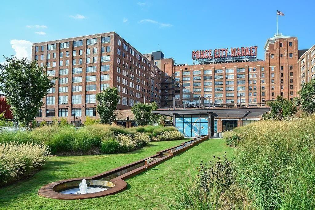 407 Linden Avenue Northeast, Unit A Atlanta, GA 30308 - Photo 58 of 65 a large building with a yard in front of it