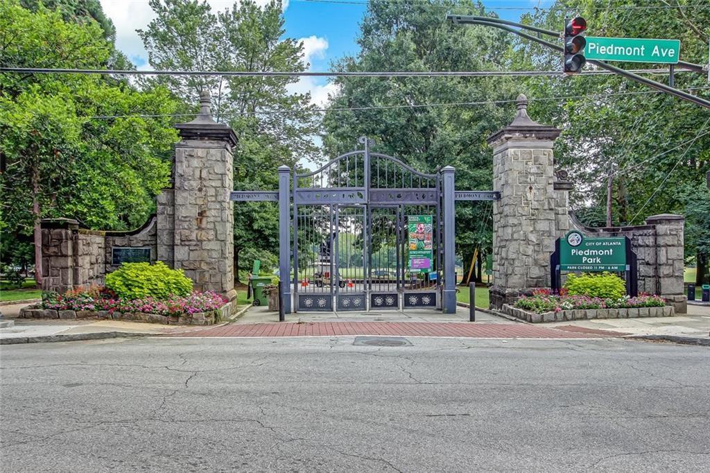 407 Linden Avenue Northeast, Unit A Atlanta, GA 30308 - Photo 63 of 65 a wooden bench sitting in front of a building