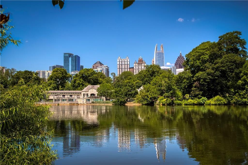 407 Linden Avenue Northeast, Unit A Atlanta, GA 30308 - Photo 64 of 65 a view of a lake with a building in front of it