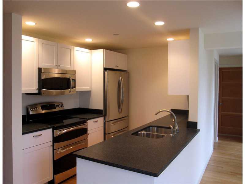 6-12 Merritt House Road, Unit 12 Orrs Island, ME 04066 - Photo 7 of 10 Kitchen. Luxury kitchens include...