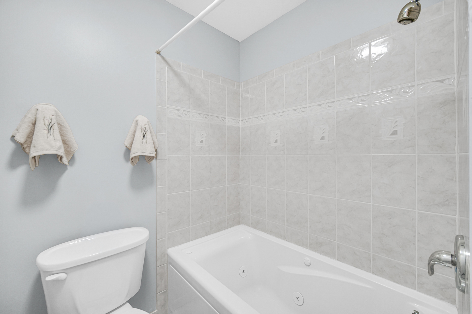 40 Huntingwood Road Matteson, IL 60443 - Photo 23 of 27 a white bath tub sitting next to a white toilet