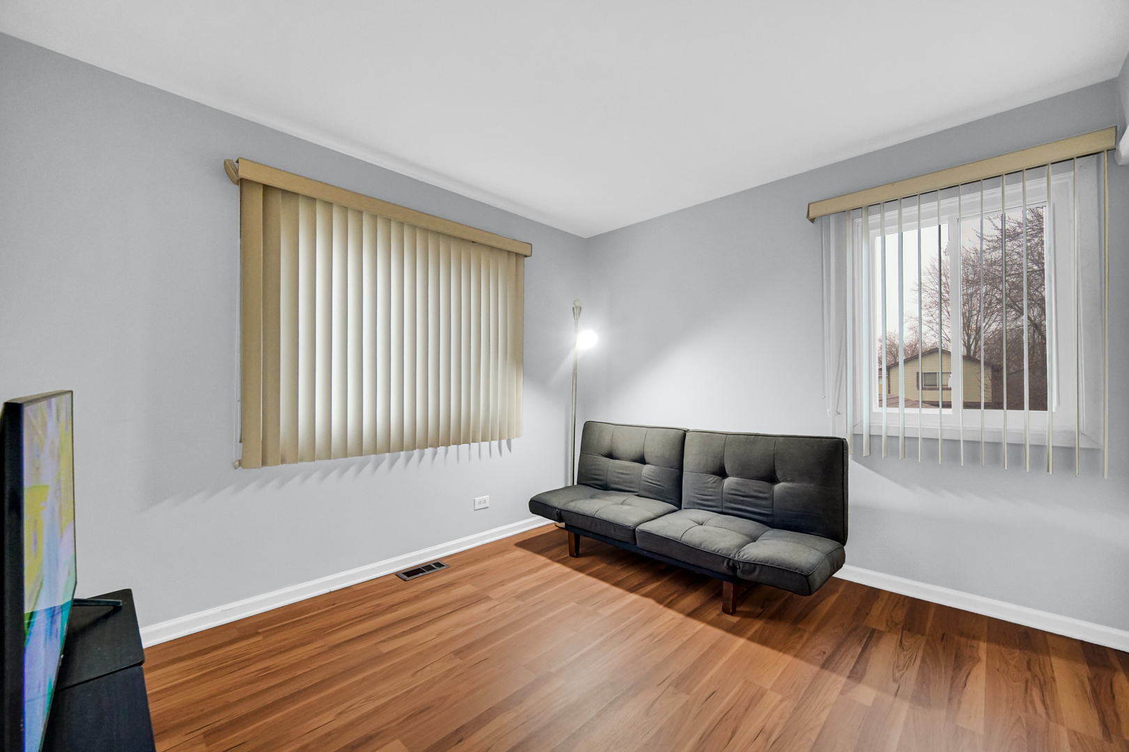 40 Huntingwood Road Matteson, IL 60443 - Photo 24 of 27 a living room with furniture and a window