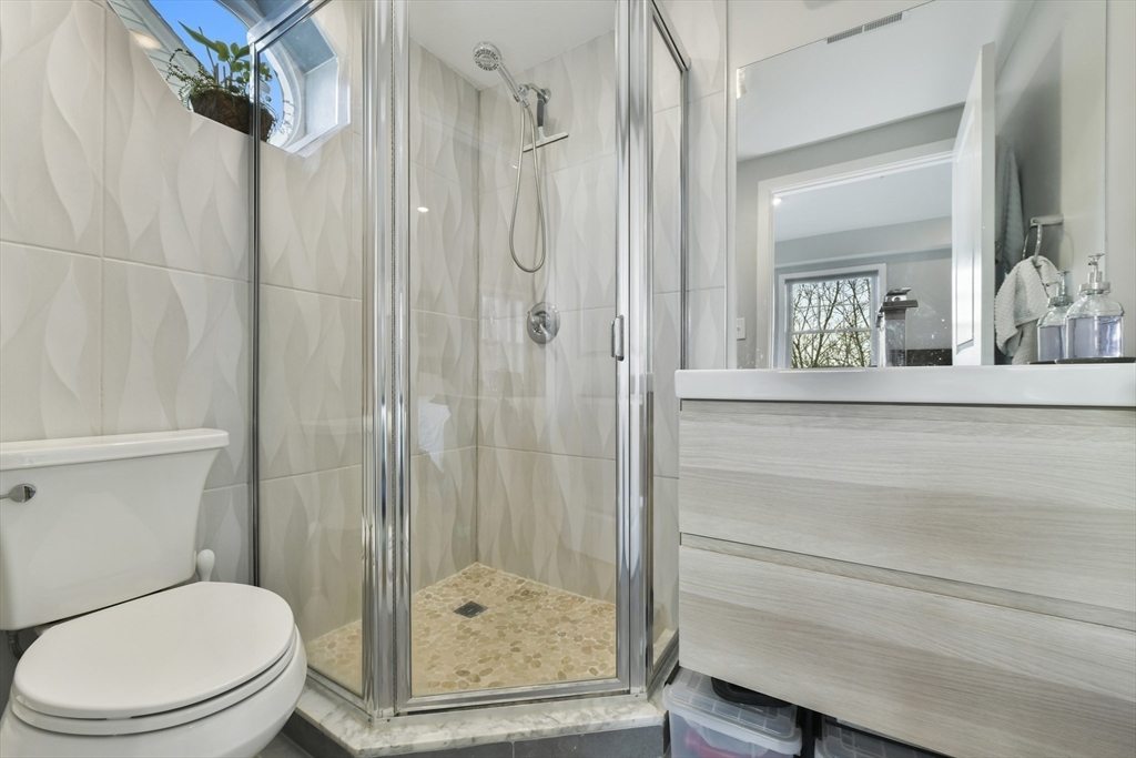 47 Sargent Street, Unit 3 Boston, MA 02125 - Photo 11 of 21 a bathroom with a toilet and a shower