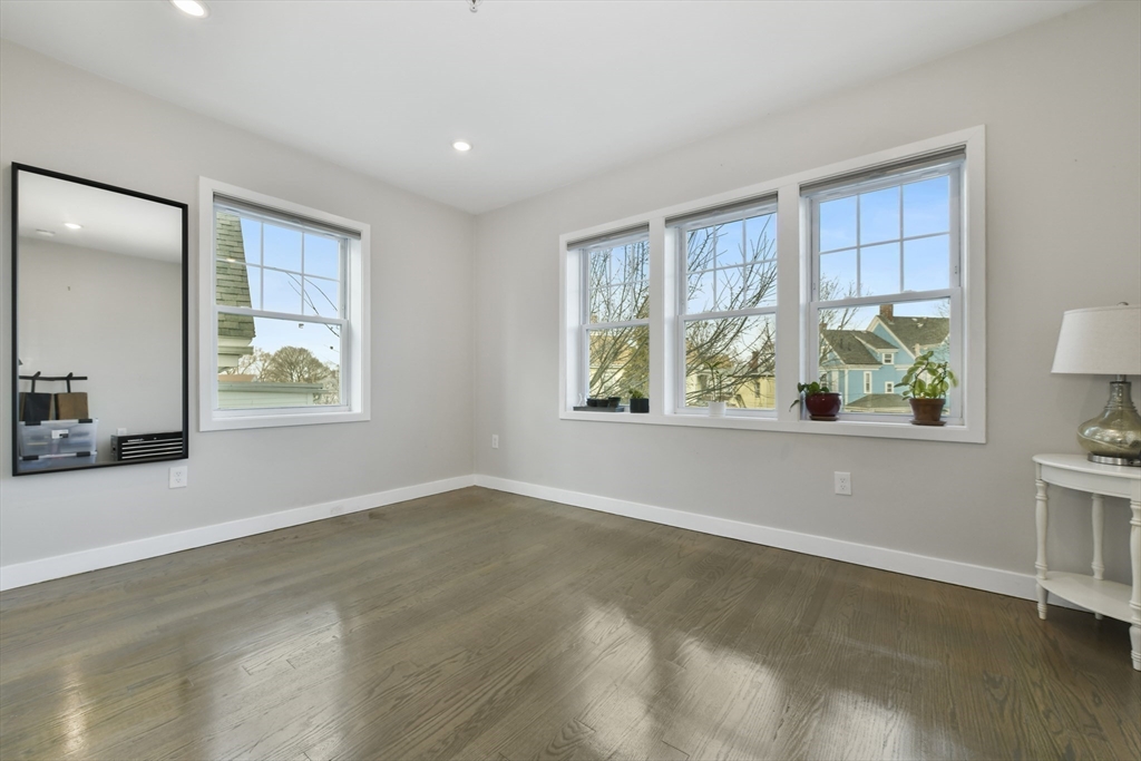 47 Sargent Street, Unit 3 Boston, MA 02125 - Photo 12 of 21 a view of an empty room with a window