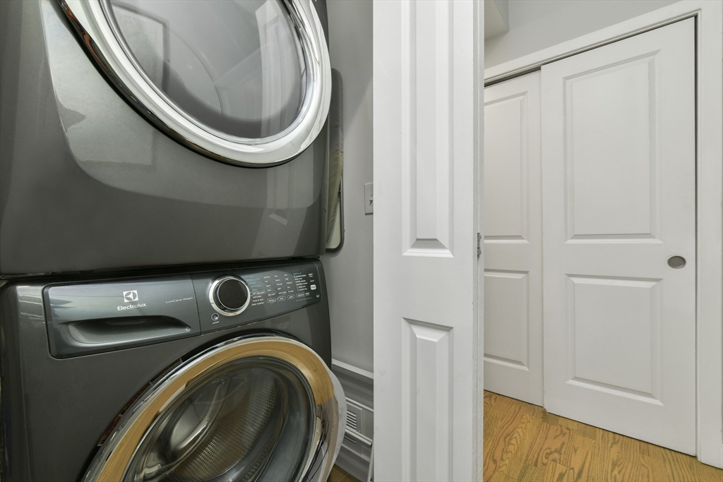 47 Sargent Street, Unit 3 Boston, MA 02125 - Photo 14 of 21 a utility room with dryer and washer