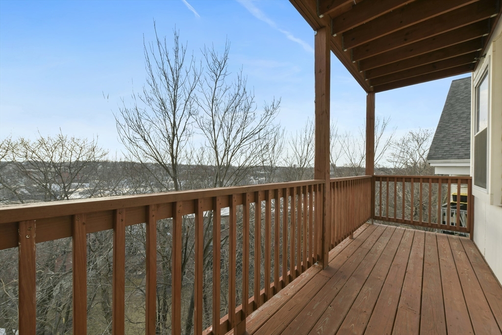 47 Sargent Street, Unit 3 Boston, MA 02125 - Photo 15 of 21 a view of balcony with wooden floor