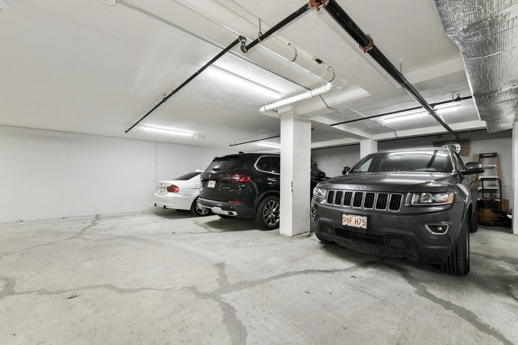 47 Sargent Street, Unit 3 Boston, MA 02125 - Photo 17 of 21 a car parked in garage