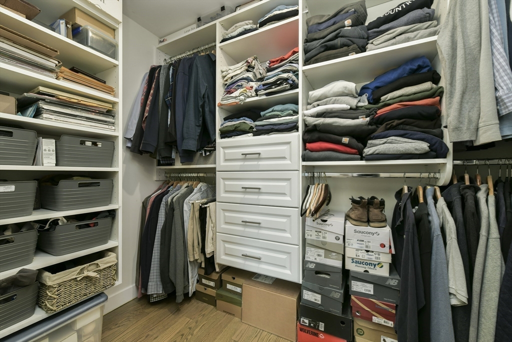 47 Sargent Street, Unit 3 Boston, MA 02125 - Photo 10 of 21 a view of walk in closet with clothes and shoes