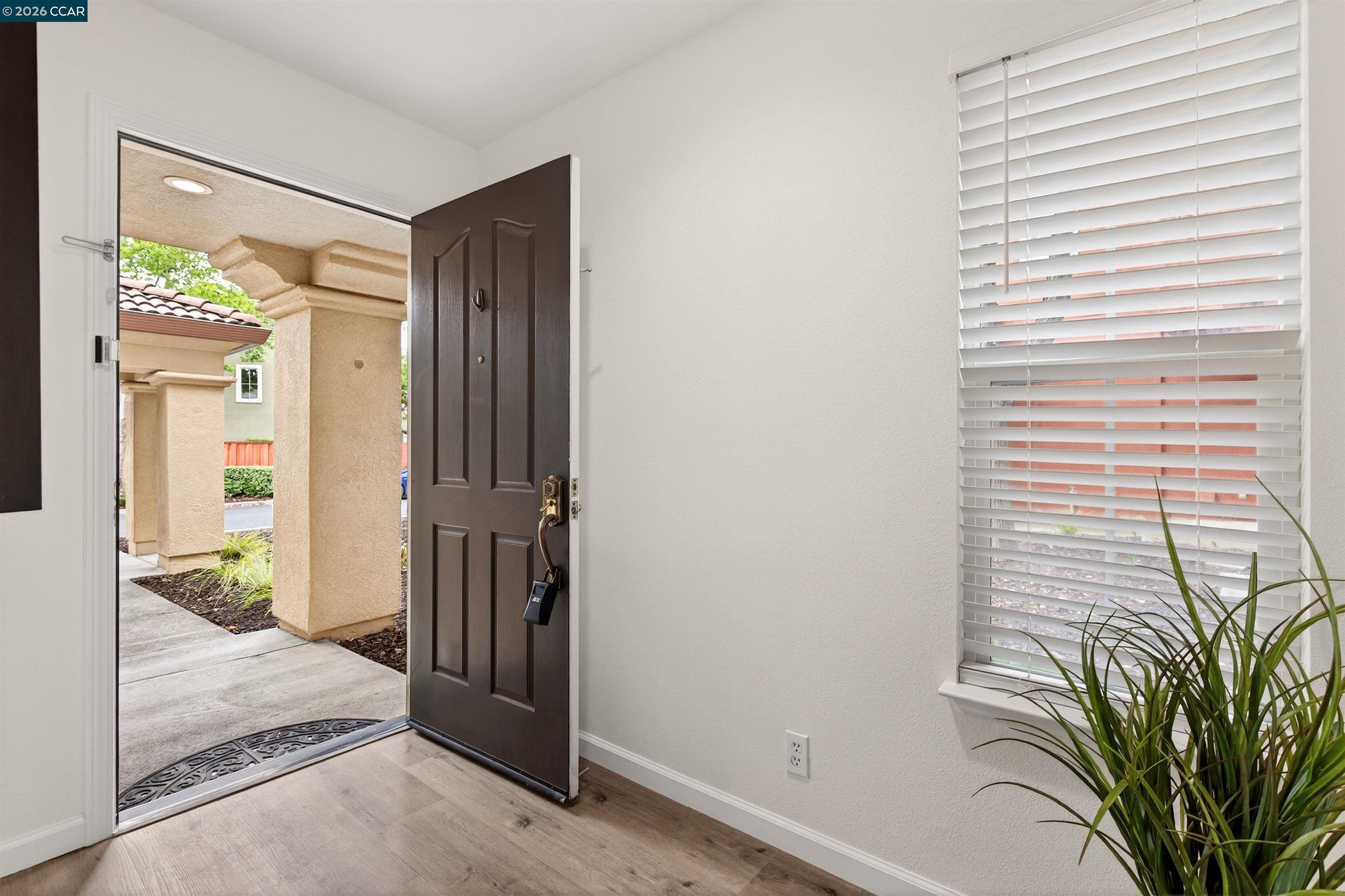 124 Coralflower Lane San Ramon, CA 94582 - Photo 4 of 47 a view of a hallway with a outdoor space
