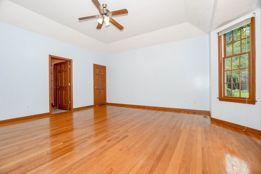 7 Upland Way Marion, MA 02738 - Photo 22 of 42 wooden floor in an empty room with a window