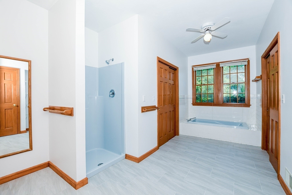 7 Upland Way Marion, MA 02738 - Photo 23 of 42 a view of an entryway with wooden floor and a livingroom