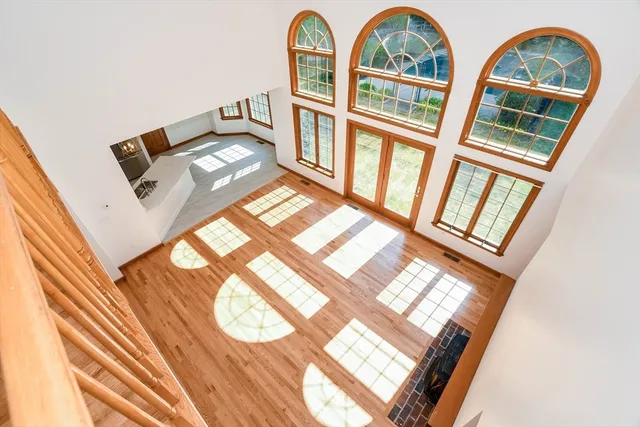 a view of wooden floor in a living room