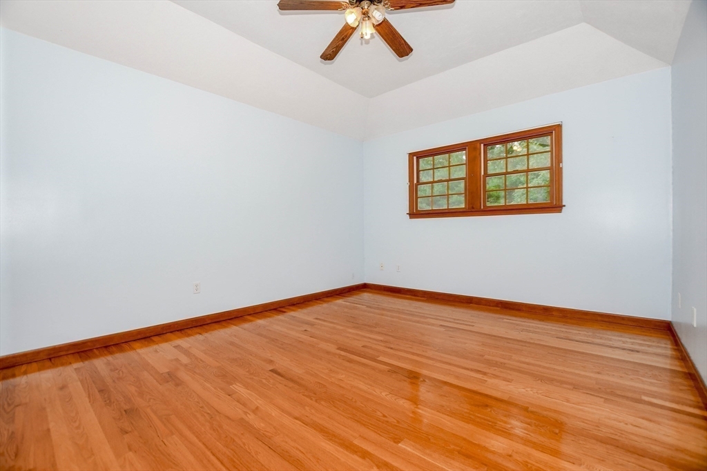 7 Upland Way Marion, MA 02738 - Photo 30 of 42 a view of an empty room with a ceiling fan