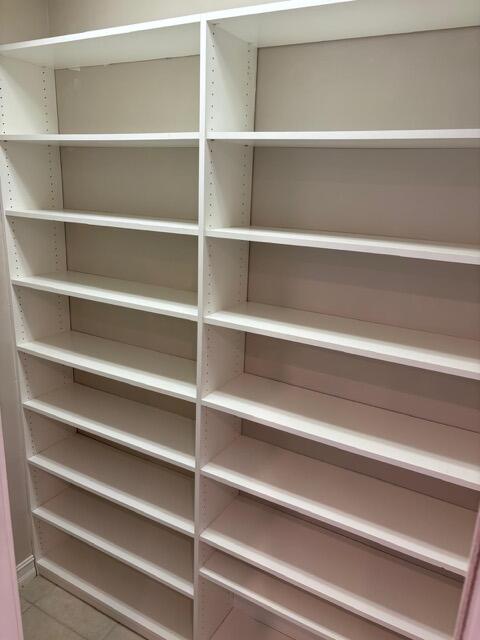 110 West Coda Circle, Unit 110 Delray Beach, FL 33444 - Photo 15 of 42 a view of walk in closet with empty racks