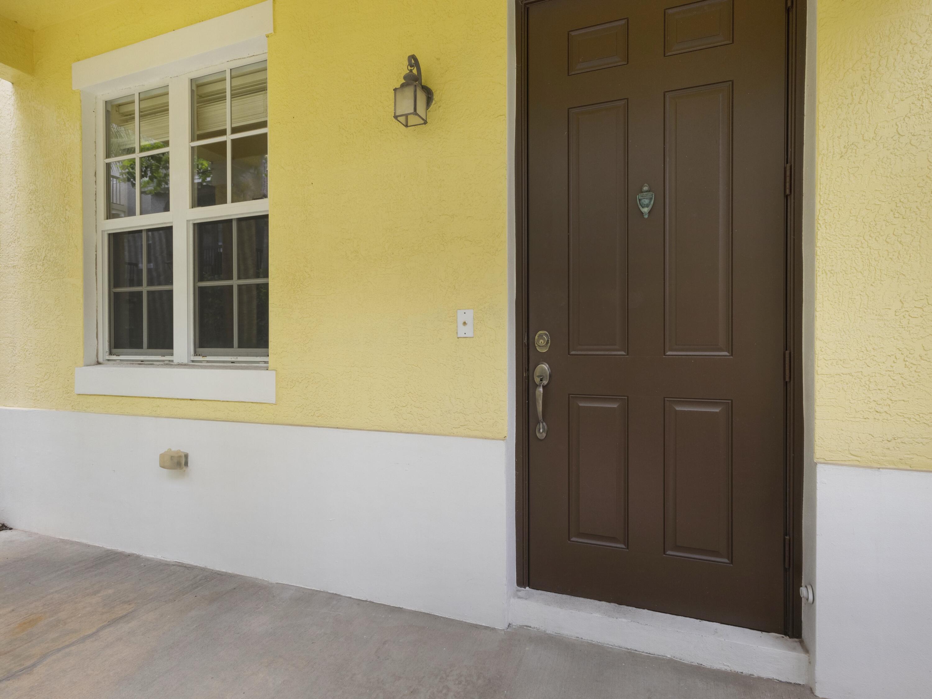 110 West Coda Circle, Unit 110 Delray Beach, FL 33444 - Photo 5 of 42 a view of front door