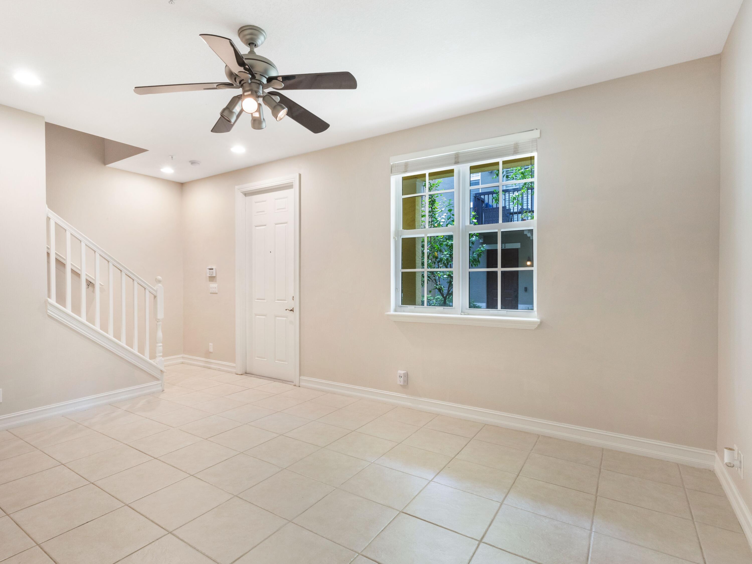 110 West Coda Circle, Unit 110 Delray Beach, FL 33444 - Photo 6 of 42 a view of an empty room with a window