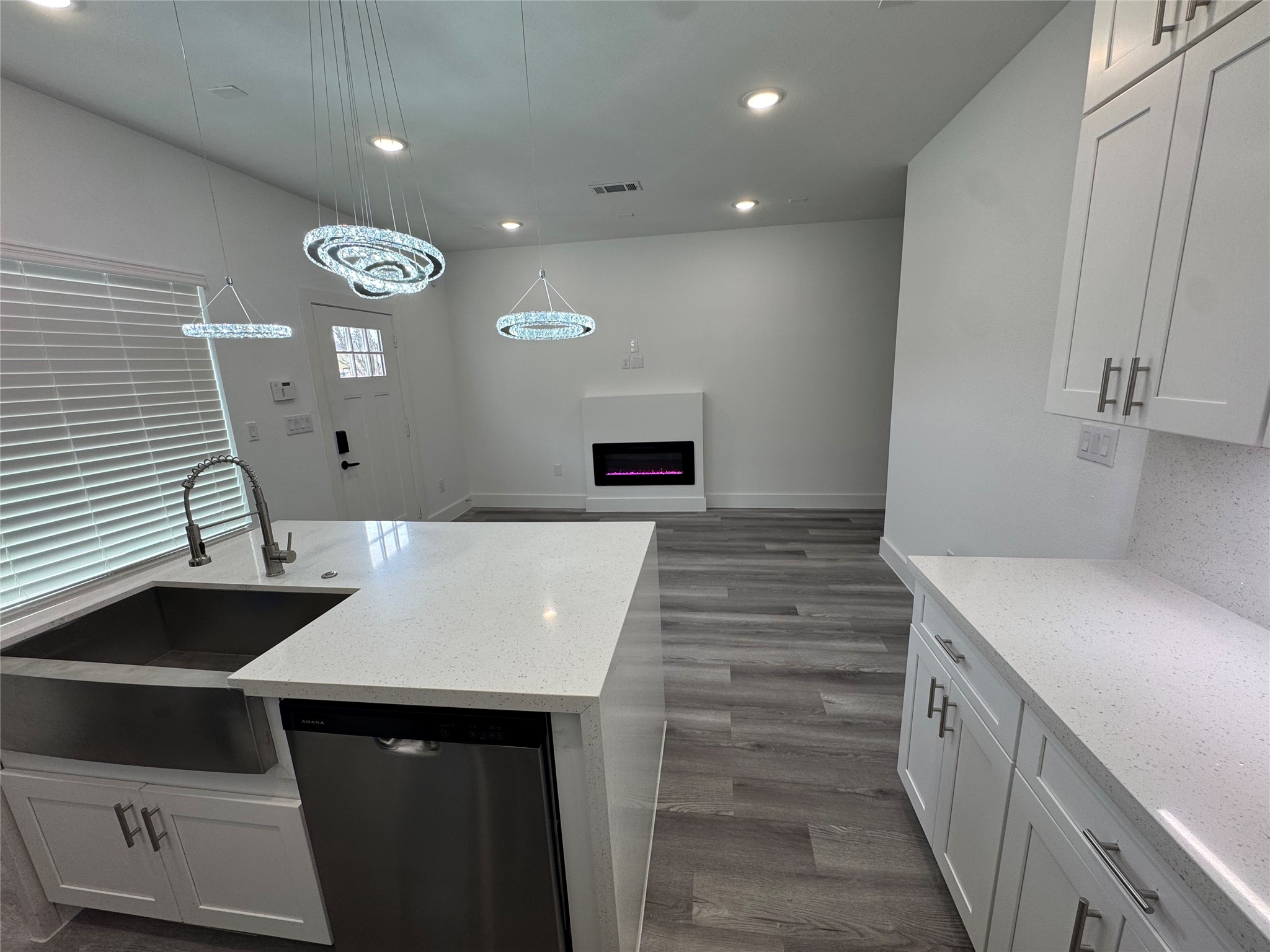 4604 Bricker Street, Unit A Houston, TX 77051 - Photo 4 of 15 a kitchen with a sink and a stove top oven