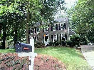 4417 Old Village Road Raleigh, NC 27612 - Photo 1 of 1 a front view of a house with garden