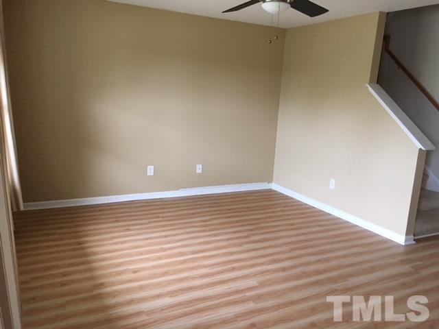 3645 Bison Hill Lane Raleigh, NC 27604 - Photo 2 of 9 a view of room with window and wooden floor