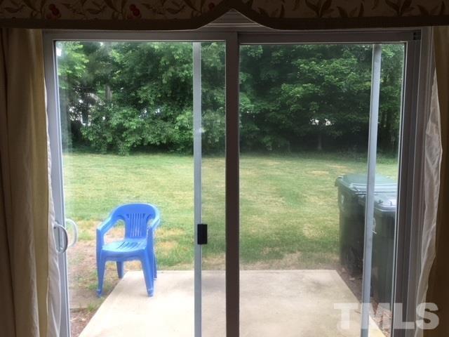 3645 Bison Hill Lane Raleigh, NC 27604 - Photo 5 of 9 a view of two chairs in balcony