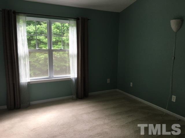 3645 Bison Hill Lane Raleigh, NC 27604 - Photo 6 of 9 an empty room with a window
