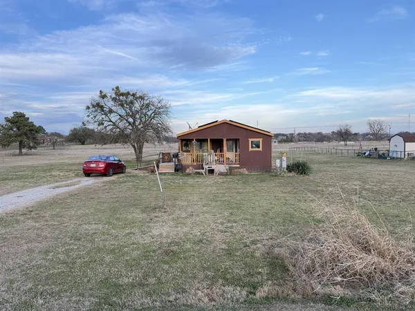 a car parked in front of a house