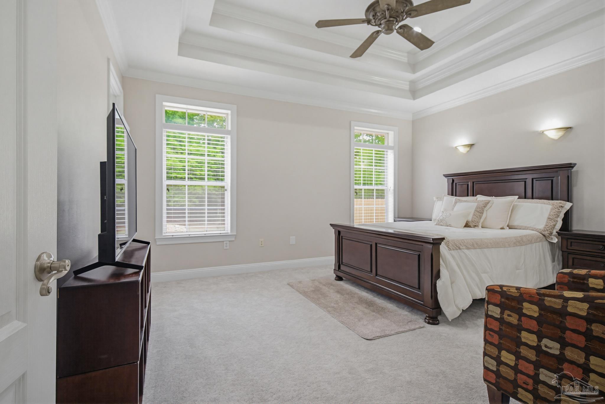 2855 Walling Road Milton, FL 32570 - Photo 26 of 55 a spacious bedroom with a bed and a window