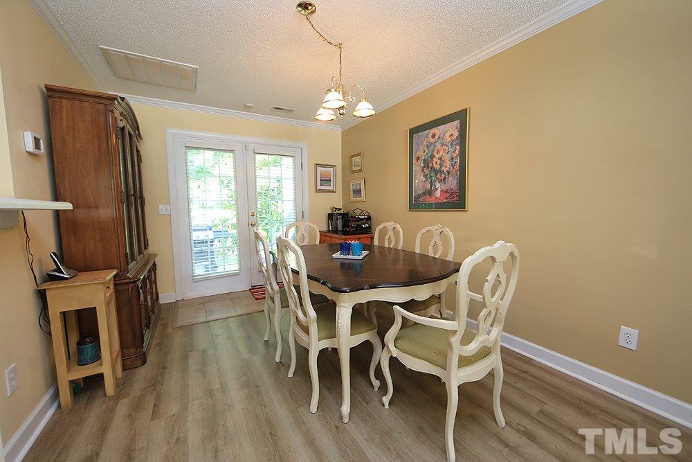7321 Bonnie Ridge Court Raleigh, NC 27615 - Photo 3 of 14 Enjoy here, or walk out to your Patio