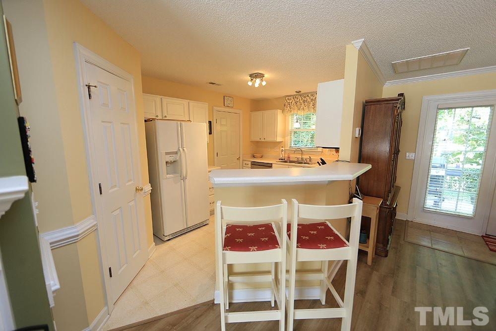7321 Bonnie Ridge Court Raleigh, NC 27615 - Photo 4 of 14 Open to Dining and Family rooms, you could also eat at this bar