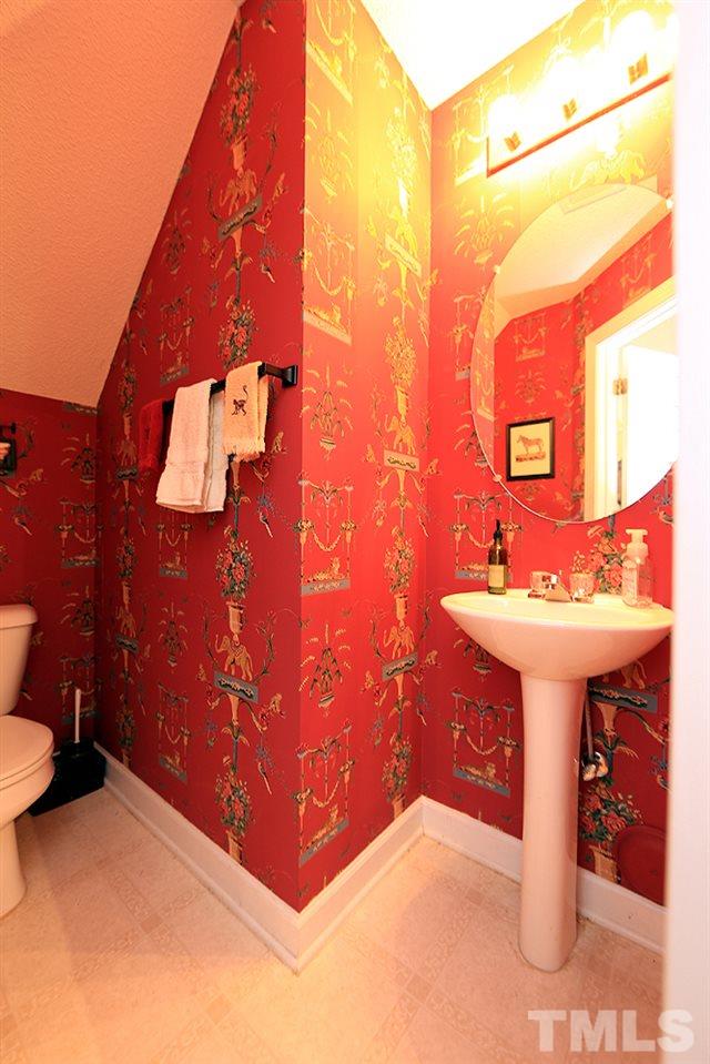7321 Bonnie Ridge Court Raleigh, NC 27615 - Photo 6 of 14 Adorable guest bath downstairs