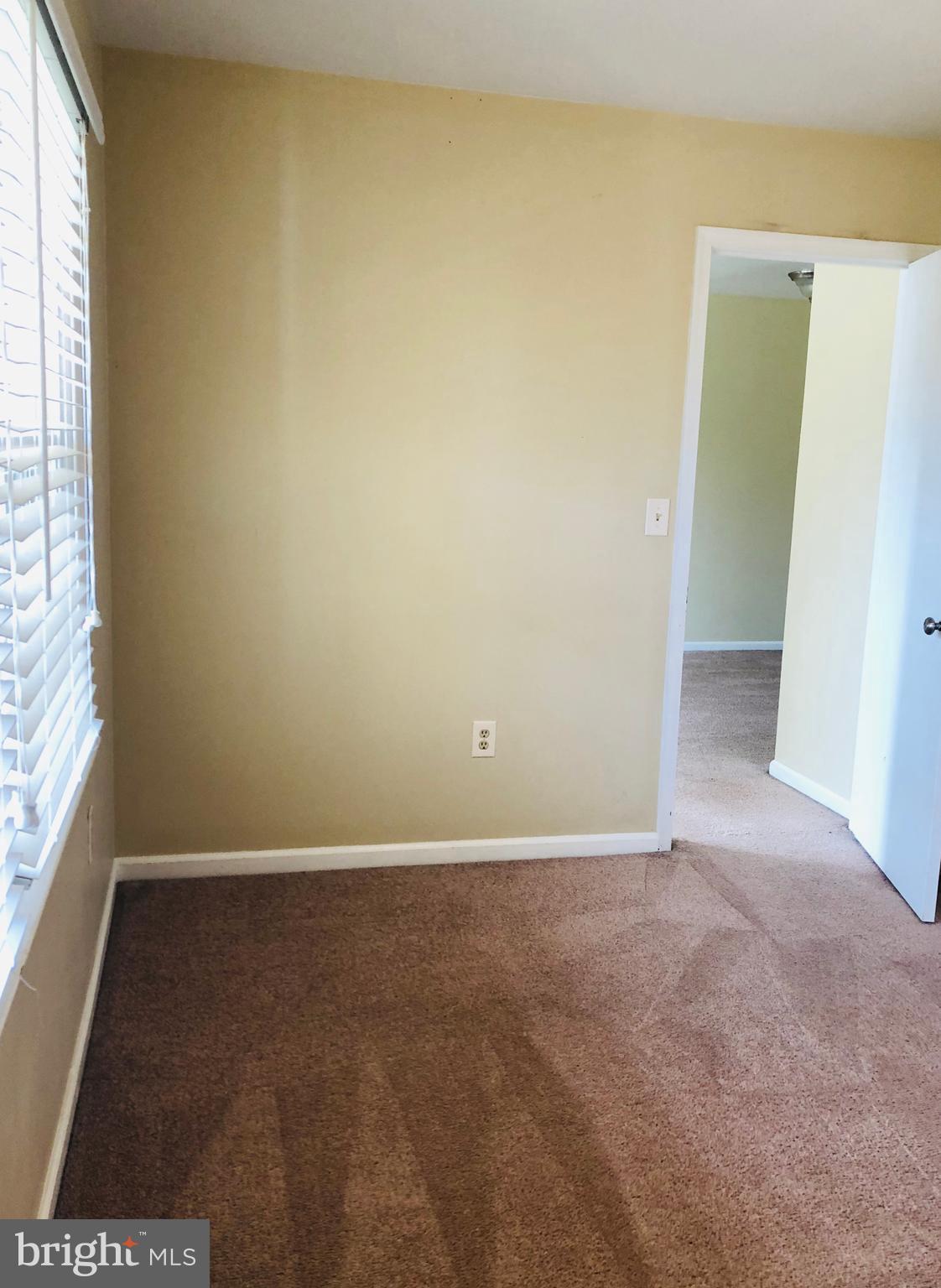 14296 Springfield Lane King George, VA 22485 - Photo 6 of 10 an empty room with windows
