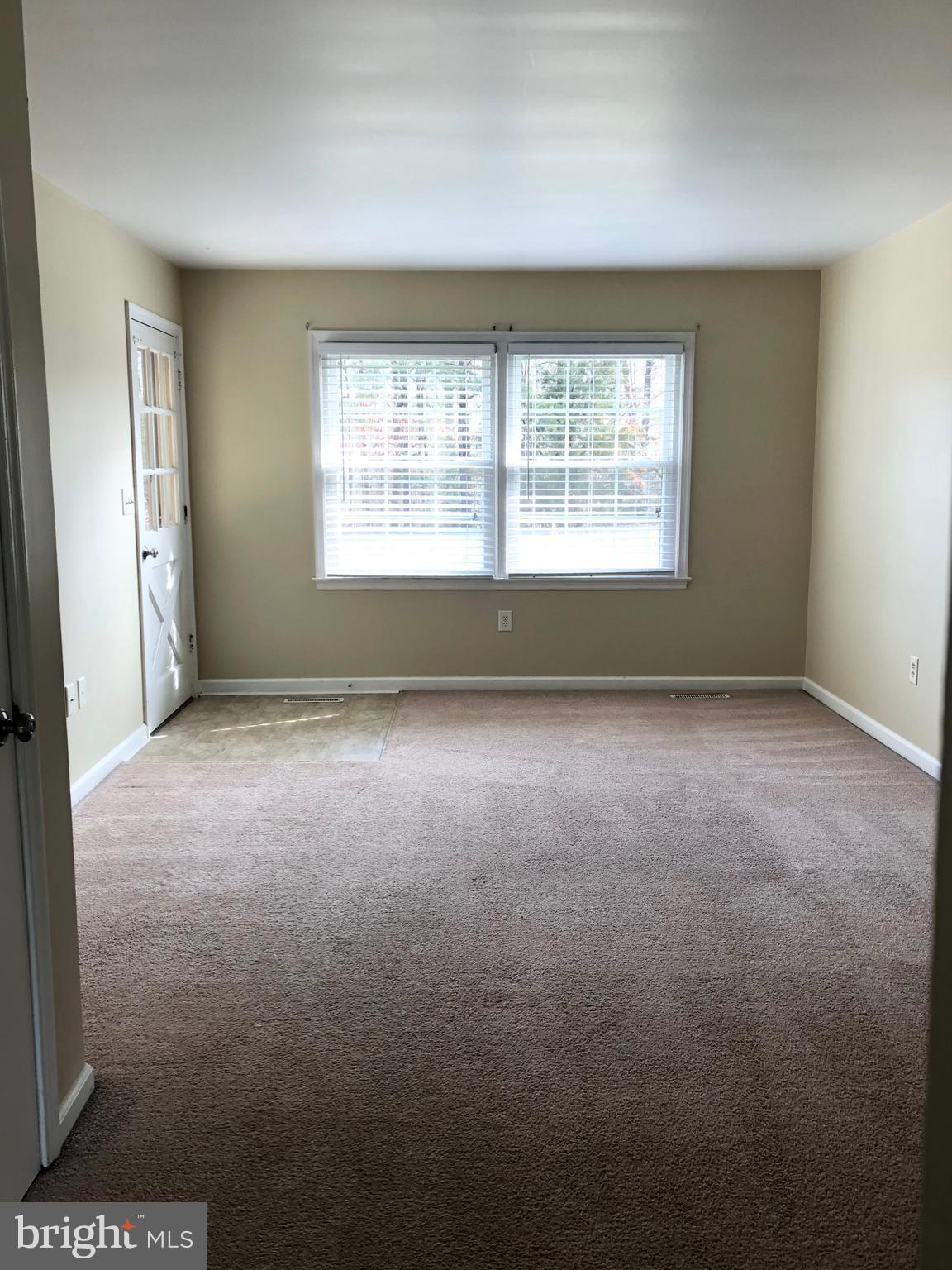 14296 Springfield Lane King George, VA 22485 - Photo 8 of 10 an empty room with windows
