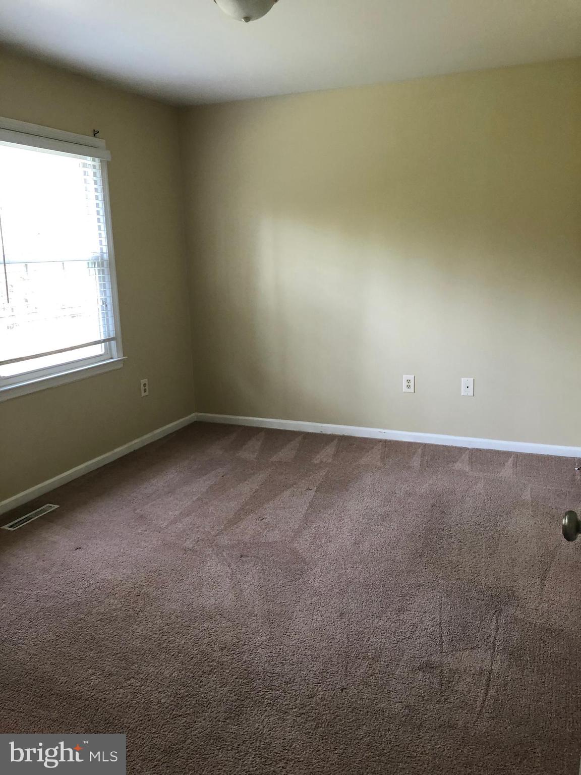 14296 Springfield Lane King George, VA 22485 - Photo 9 of 10 an empty room with a window
