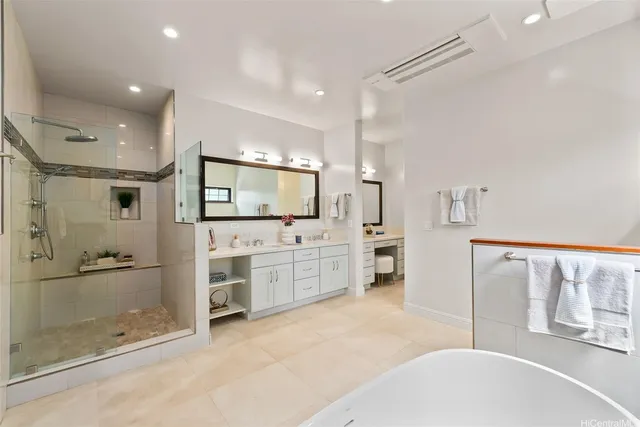 a large white kitchen with a large window