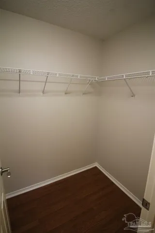 a view of an empty walk in closet